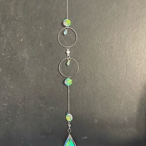 Elegant Silver and Iridescent Crystal Suncatcher
